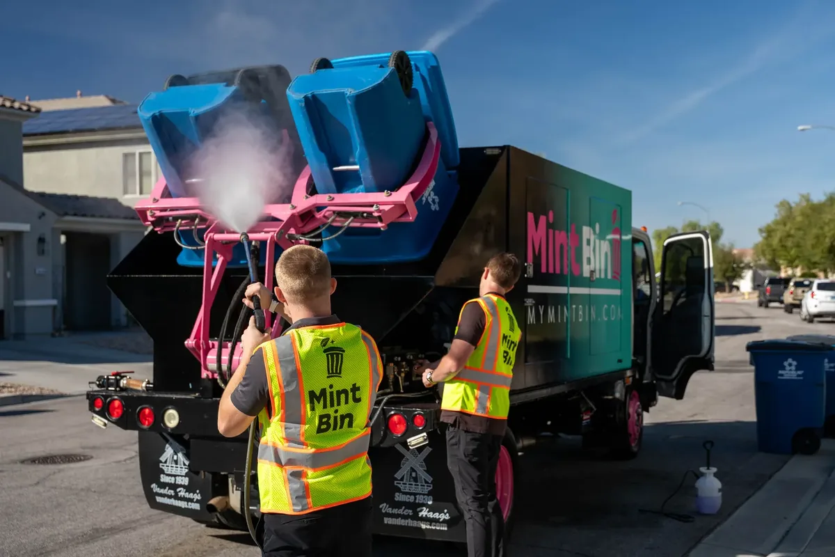 MintBin crew steam cleaning trash cans in Las Vegas